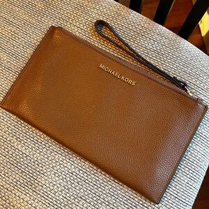 Michael Kors envelope clutch/ wristlet.